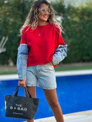 Red top with denim sleeves