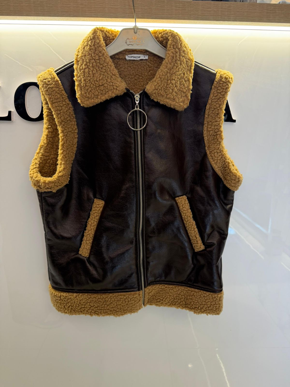 Brown leather vest
